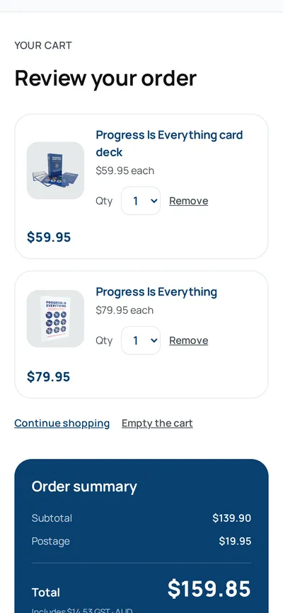 The cart on a phone, with a card deck and a book above an order summary that adds the postage.